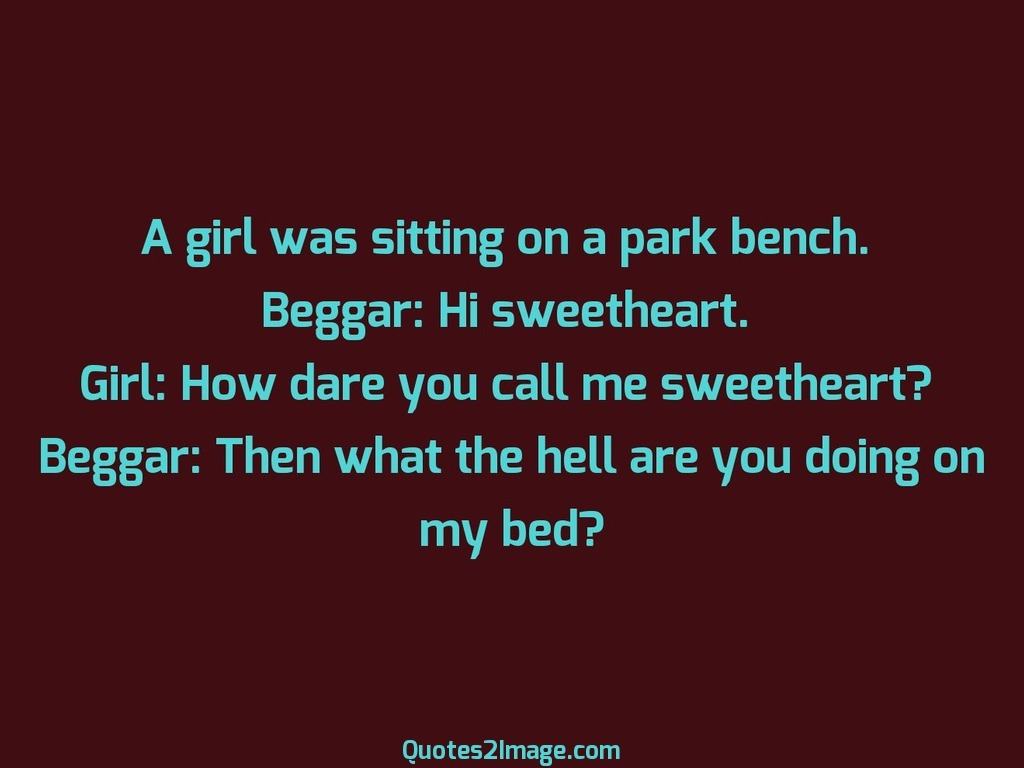 A girl was sitting on a park